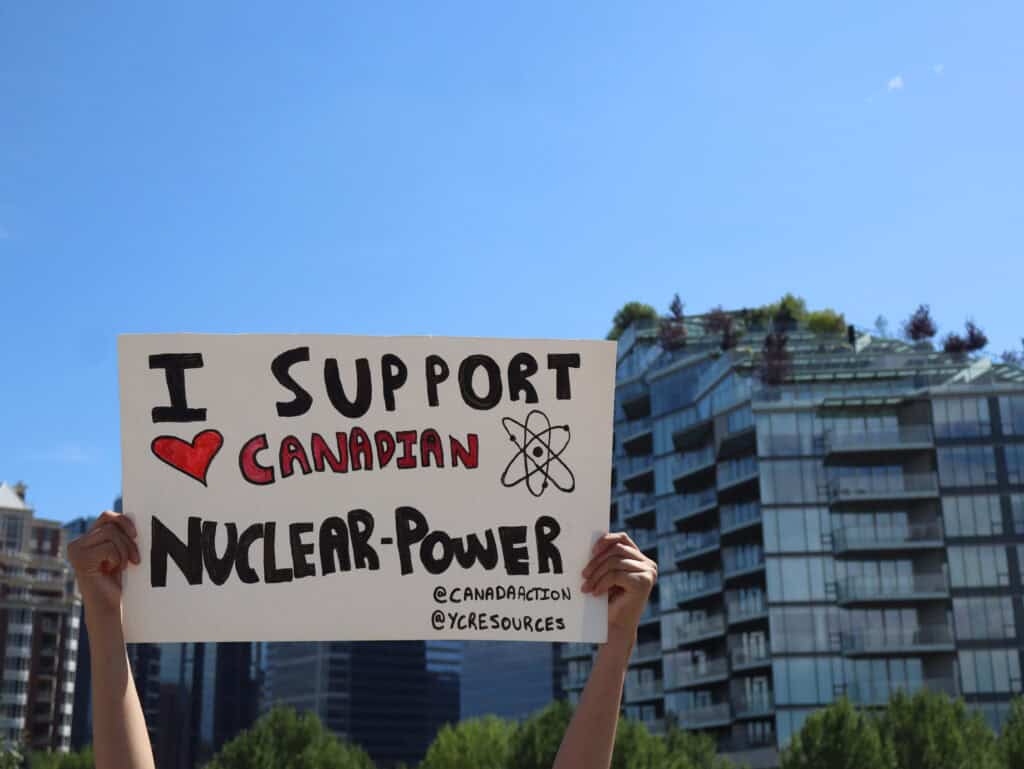 Support for Canadian nuclear power protest sign against nuclear energy, clean energy advocacy, environmental activism, Young Canadians for Resources.