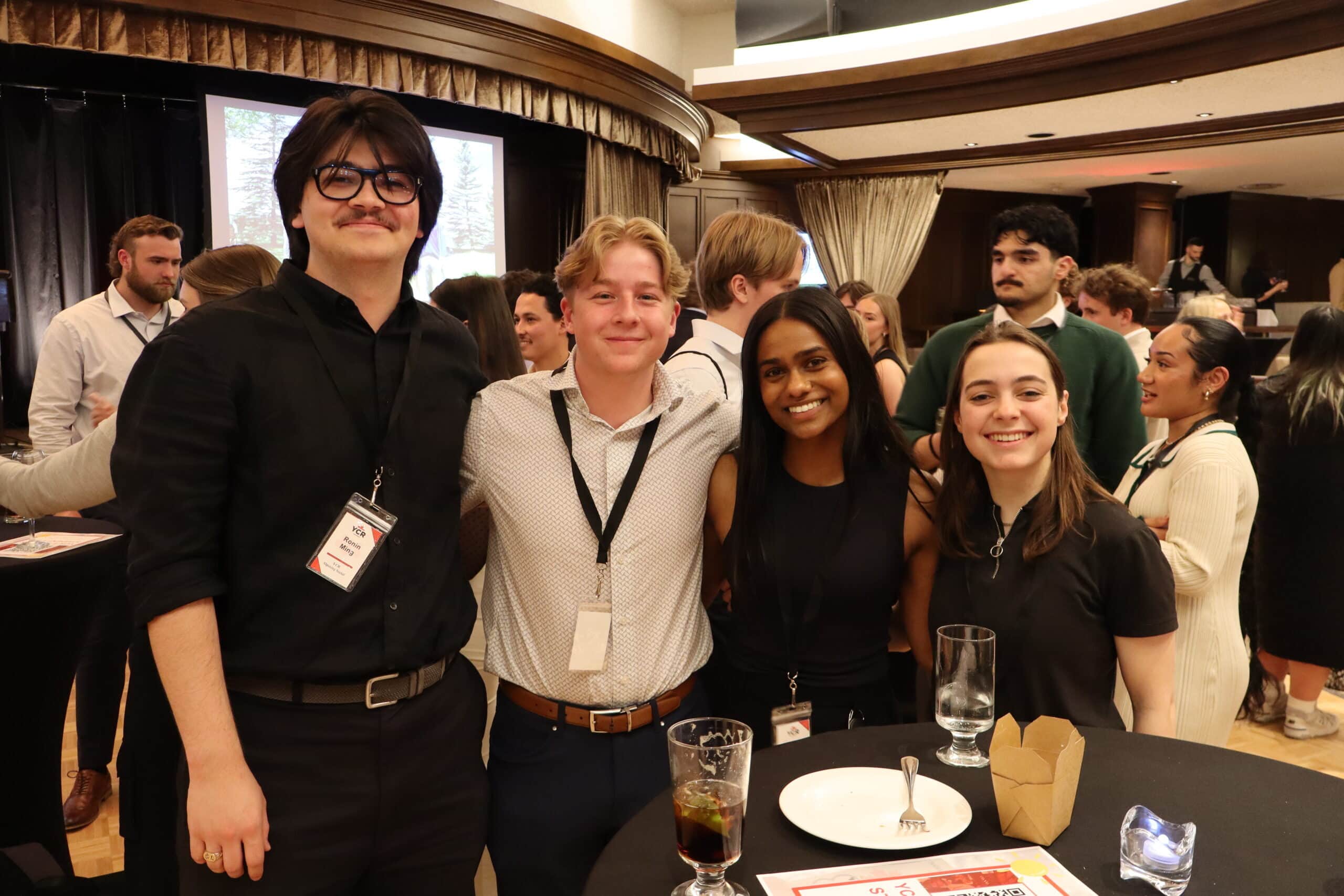 Vibrant group of young adults at professional networking event.